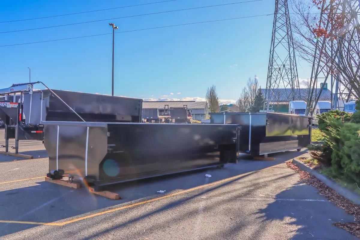 Roll-off dumpster ready for waste disposal at job site for Commercial Dumpster Rental in Capitol View
